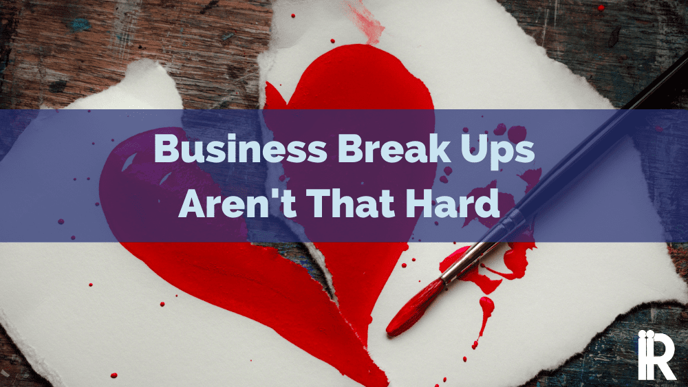 paper valentine's heart ripped in two. business break up